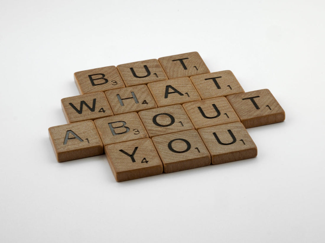 four scrabble tiles spelling out the words but what about you?